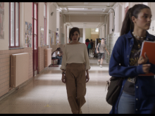 Amal in a school corridor ©Scope Pictures