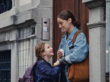 A child and a girl smiling (still 4)